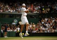 Tennis - Wimbledon - All England Lawn Tennis and Croquet Club, London, Britain - July 13, 2018 John Isner of the U.S. in action during his semi final match against South Africa's Kevin Anderson REUTERS/Tony O'Brien