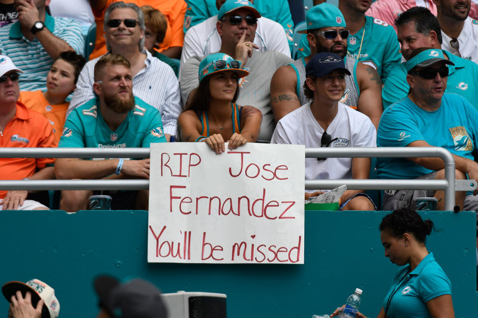 <p>A Miami Dolphins fan holds a sign paying respects to Miami Marlins pitcher Jose Fernandez during the game against the Cleveland Browns on September 25, 2016 in Miami Gardens, Fla. (Eric Espada/Getty Images) </p>