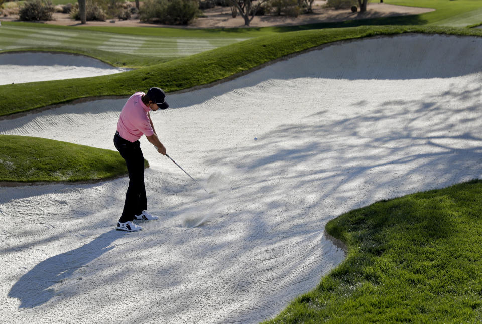 Aaron Baddeley hits from a bunker on the second hole during the second round of the Phoenix Open PGA golf tournament, Friday, Feb. 1, 2019, in Scottsdale, Ariz. (AP Photo/Matt York)