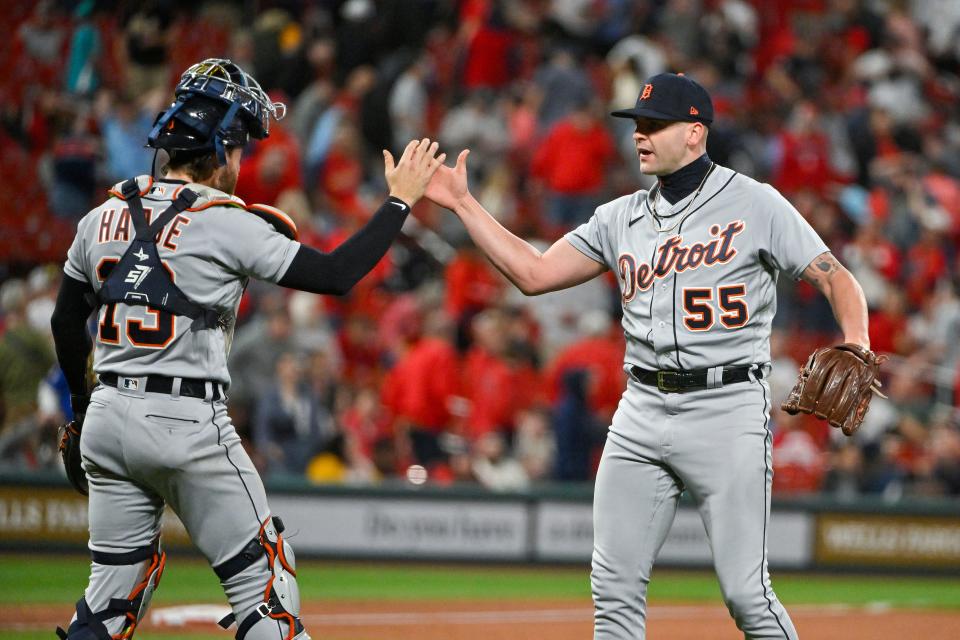 Detroit Tigers relief pitcher Alex Lange celebrates with catcher Eric Haase after the Tigers defeated the St. Louis Cardinals, 5-4, at Busch Stadium in St. Louis on Friday, May 5, 2023.