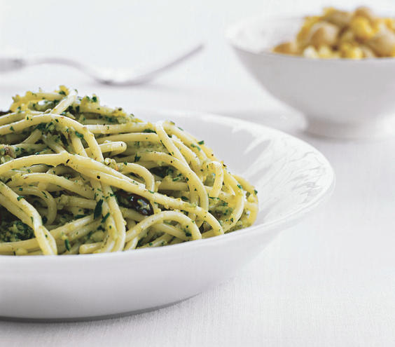 <p>The sauce gets its vibrant color from olives, parsley, and basil.<br> <br><strong>Get the recipe:</strong> <a rel="nofollow noopener" href="http://www.realsimple.com/food-recipes/browse-all-recipes/pasta-green-olive-pesto-10000000524318/index.html" target="_blank" data-ylk="slk:Pasta With Green Olive Pesto;elm:context_link;itc:0;sec:content-canvas" class="link ">Pasta With Green Olive Pesto</a></p>