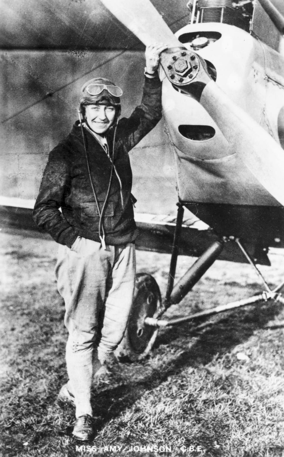 English aviatorJohnson in her flying suit, standing in front of her DH60 Moth aeroplane ‘Jason’. In 1930 Johnson (1903-1941) became the first woman to fly solo from England to Australia, winning £10,000 from the ‘Daily Mail’ newspaper. In 1932, she set a record for the fastest solo flight from England to Cape Town and broke that record four years later. In 1933, with her husband, James Mollison (1905-1959) she flew in a De Havilland biplane non-stop across the Atlantic in 39 hours. She joined the Air Transport Auxilary as a pilot in WWII and died when her plane was lost over the Thames estuary. (Photo: Science & Society Picture Library/SSPL/Getty Images)