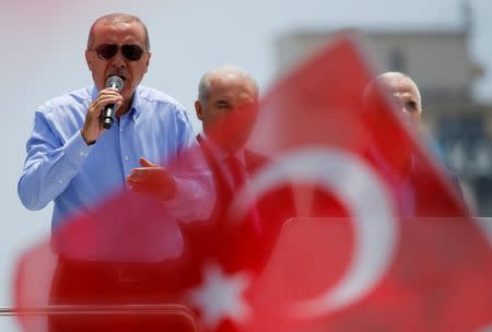 Turkish President Tayyip Erdogan greets his supporters in Istanbul, Turkey June 22, 2018. REUTERS/Alkis Konstantinidis