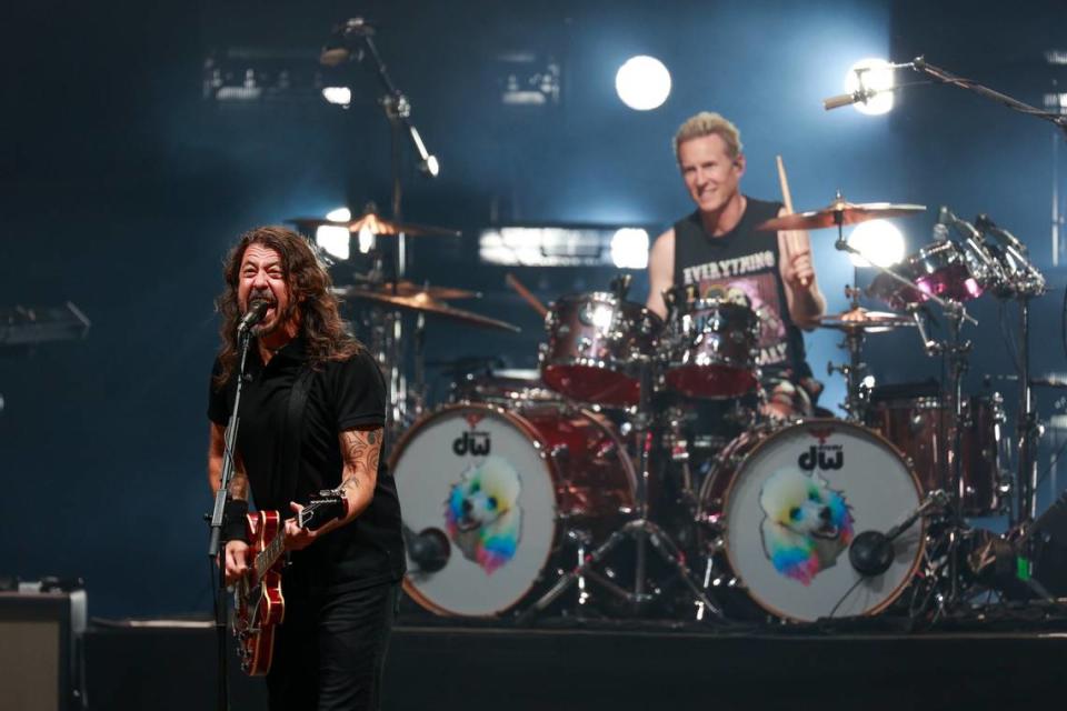 Lead singer and guitarist Dave Grohl of Foo Fighters performs alongside drummer Josh Freese at PNC Music Pavilion in Charlotte on Thursday night.