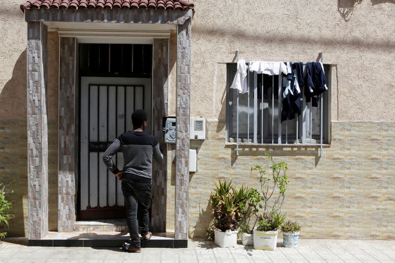 Saddou Habi, 30, from Guinea stands in front of his apartment at Hay Nahda on the outskirts of Rabat