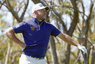 Lee Westwood, of England, watches his shot from the third tee during the final round of the Arnold Palmer Invitational golf tournament Sunday, March 7, 2021, in Orlando, Fla. (AP Photo/John Raoux)