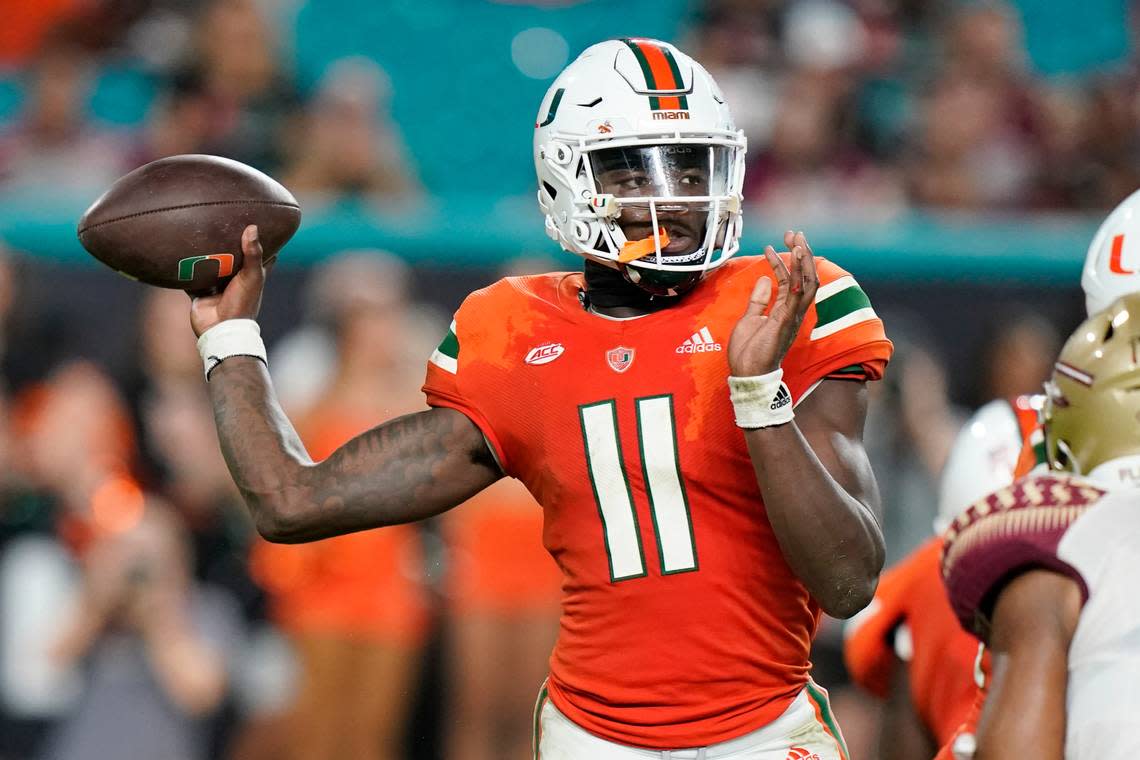 Miami quarterback Jacurri Brown (11) stands back to throw during the second half of an NCAA college football game against Florida State, Saturday, Nov. 5, 2022, in Miami Gardens, Fla.