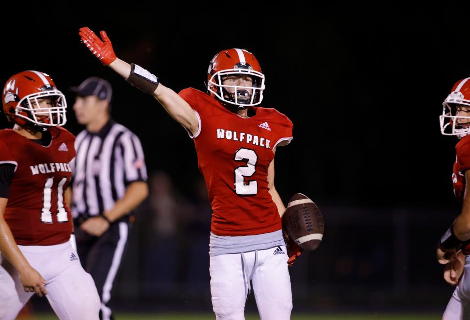 Laingsburg's Vance Klont (2) celebrates his interception against Pewamo-Westphalia, Friday, Sept. 8, 2023, in Laingsburg.