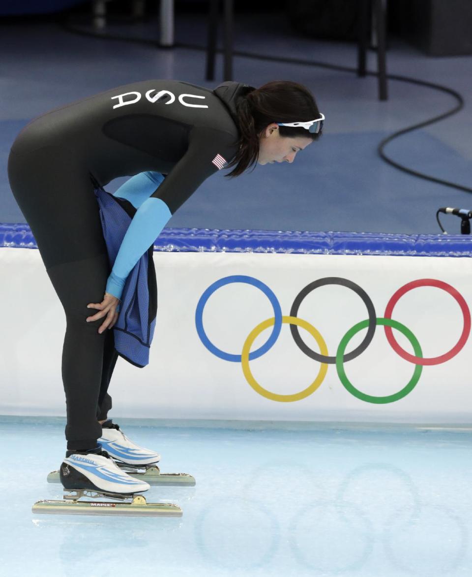 Brittany Bowe of the U.S. catches her breath after competing in the women's 1,500-meter race at the Adler Arena Skating Center during the 2014 Winter Olympics in Sochi, Russia, Sunday, Feb. 16, 2014. (AP Photo/Matt Dunham)