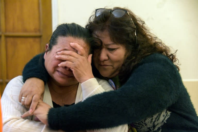 Francisca Soria (L), mother of missing crew member David Melian, is embraced by Victoria Morales, mother of submariner Esteban Garcia, in Mar del Plata, Argentina, on November 07, 2018