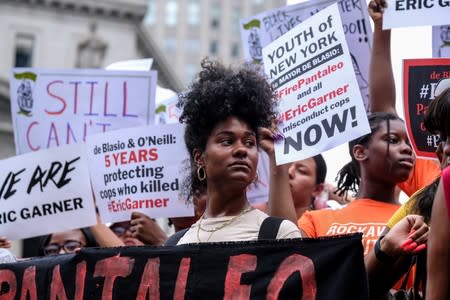 Protesters march and rally on the fifth anniversary of the death of Eric Garner in New York