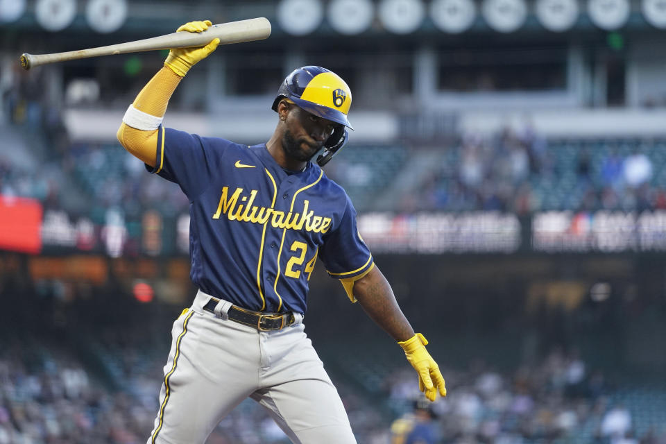 Milwaukee Brewers' Andrew McCutchen reacts after hitting an RBI sacrifice fly against the San Francisco Giants during the fourth inning of a baseball game in San Francisco, Thursday, July 14, 2022. (AP Photo/Godofredo A. Vásquez)