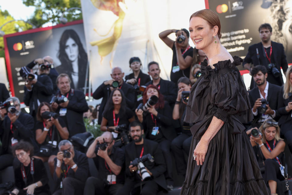 Jury president Julianne Moore poses for photographers upon arrival at the premiere of the film 'The Hanging Sun' during the 79th edition of the Venice Film Festival in Venice, Italy, Saturday, Sept. 10, 2022. (Photo by Joel C Ryan/Invision/AP)