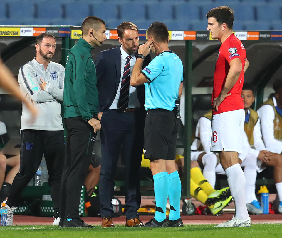 SOFIA, BULGARIA - OCTOBER 14: Gareth Southgate, Manager of England speaks with referee Vasil Levski during the UEFA Euro 2020 qualifier between Bulgaria and England on October 14, 2019 in Sofia, Bulgaria. (Photo by Catherine Ivill/Getty Images)