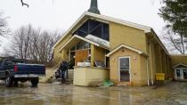 This couple stayed up all night to keep flood water out of their home