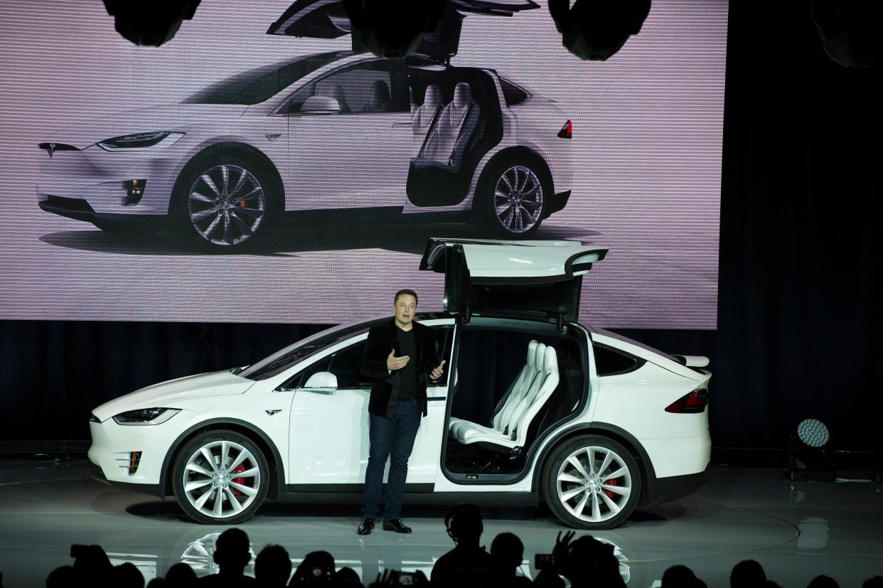 Tesla Motors CEO Elon Musk unveils the Model X at a launch event in Fremont, Calif. on Sept. 29, 2015. The Tesla Motors X is an all-wheel drive SUV featuring a 90 kWh battery.