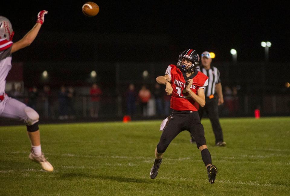 Bucyrus' Malachi Bayless rolls out and tosses a pass to the sideline.