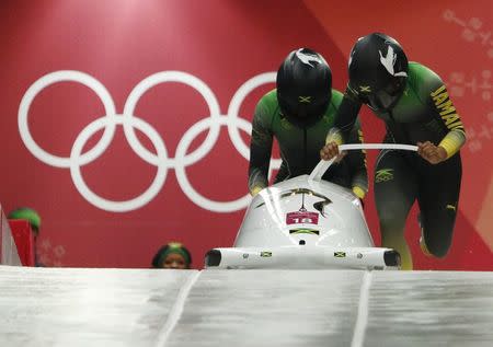 Bobsleigh - Pyeongchang 2018 Winter Olympics - Women's Competition - Olympic Sliding Centre - Pyeongchang, South Korea - February 20, 2018 - Jazmine Fenlator-Victorian and Carrie Russell of Jamaica in action. REUTERS/Edgar Su