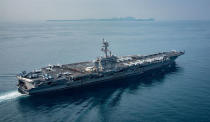 FILE PHOTO: The U.S. aircraft carrier USS Carl Vinson transits the Sunda Strait, Indonesia on April 15, 2017. Sean M. Castellano/Courtesy U.S. Navy/Handout via REUTERS/File photo