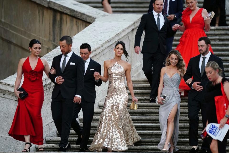 USA's Rickie Fowler and his wife Allison (centre) at the Spanish Steps of Rome, Italy, ahead of the 2023 Ryder Cup. Picture date: Wednesday September 27, 2023. 73921130 (Press Association via AP Images)