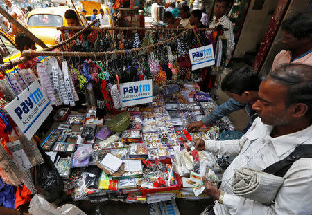 Advertisements of Paytm, a digital wallet company, are seen placed at a road side stall in Kolkata, India, January 25, 2017. REUTERS/Rupak De Chowdhuri