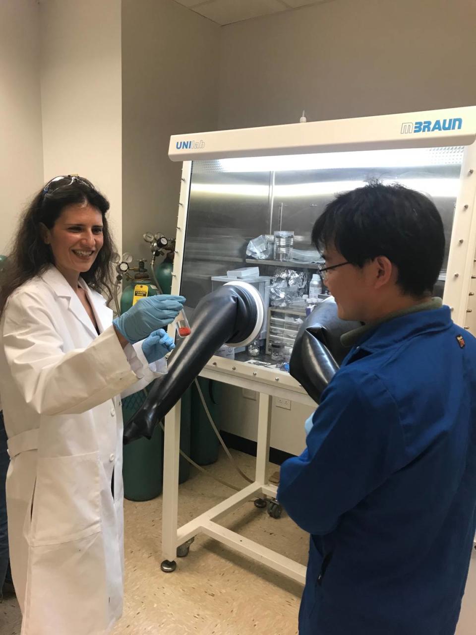 Katerina Aifantis, Ph.D., works in her lab at the University of Florida with researcher Pu Hu, Ph.D.