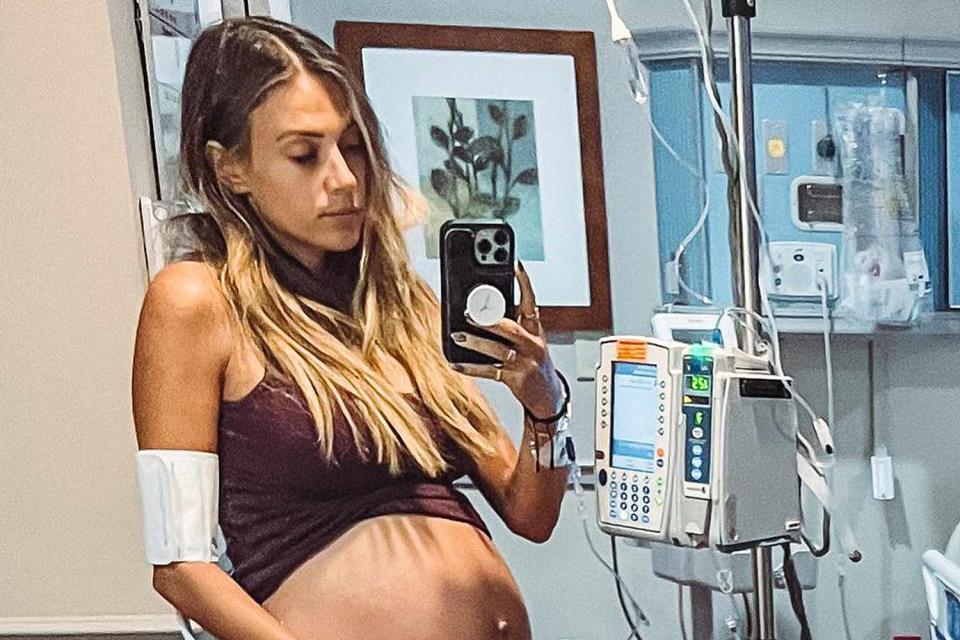 <p>Jana Kramer/Instagram</p> Jana Kramer poses in hospital room after discovering she had a bacterial infection 