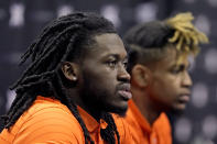 Oklahoma State's Isaac Likekele Jr., left, and Rondel Walker speak to the media during Big 12 NCAA college basketball media day Wednesday, Oct. 20, 2021, in Kansas City, Mo. (AP Photo/Charlie Riedel)