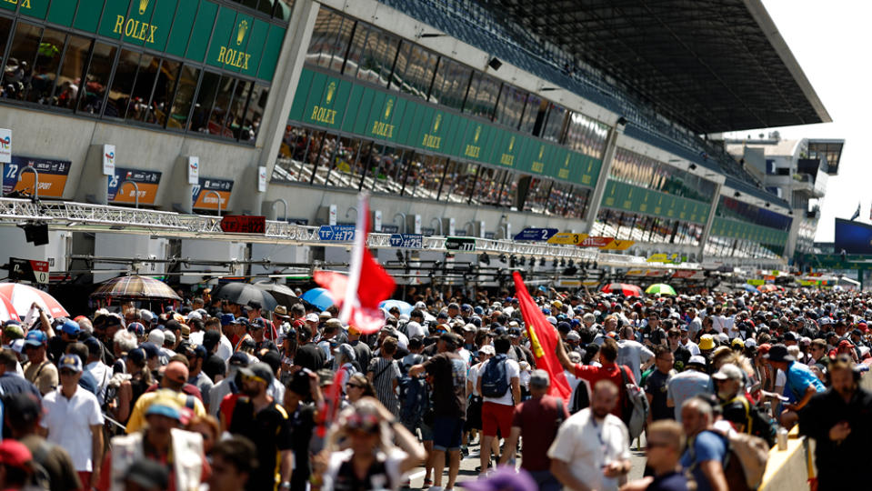 A reported 300,000 spectators were on hand for the 100th anniversary of Le Mans, a minority of which were granted access to preview pit lane before the race's start.