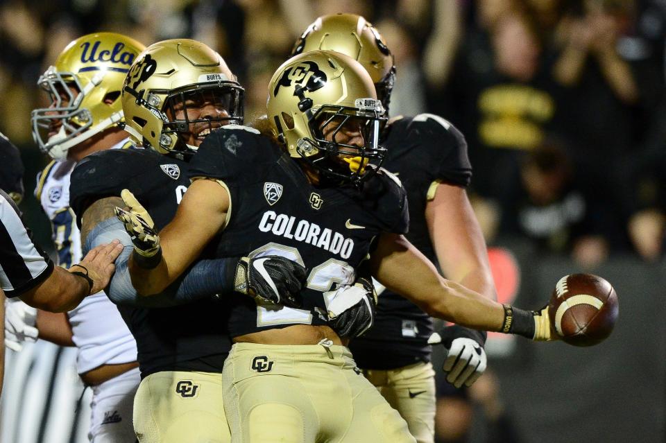 Colorado running back Phillip Lindsay celebrates a first-half TD. (Getty)