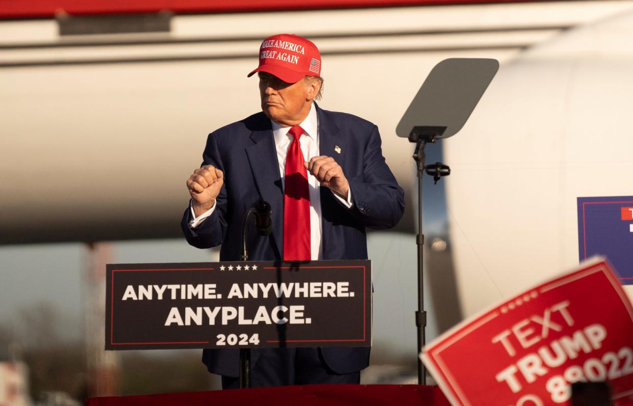 Former President Donald Trump speaks to a crowd of supporters during a rally at Avflight Saginaw in Freeland on Wednesday, May 1, 2024.