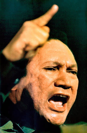 FILE PHOTO: Manuel Noriega gestures while giving a speech in Panama City in this March 1988 file photo. REUTERS/Gary Hershorn/File Photo