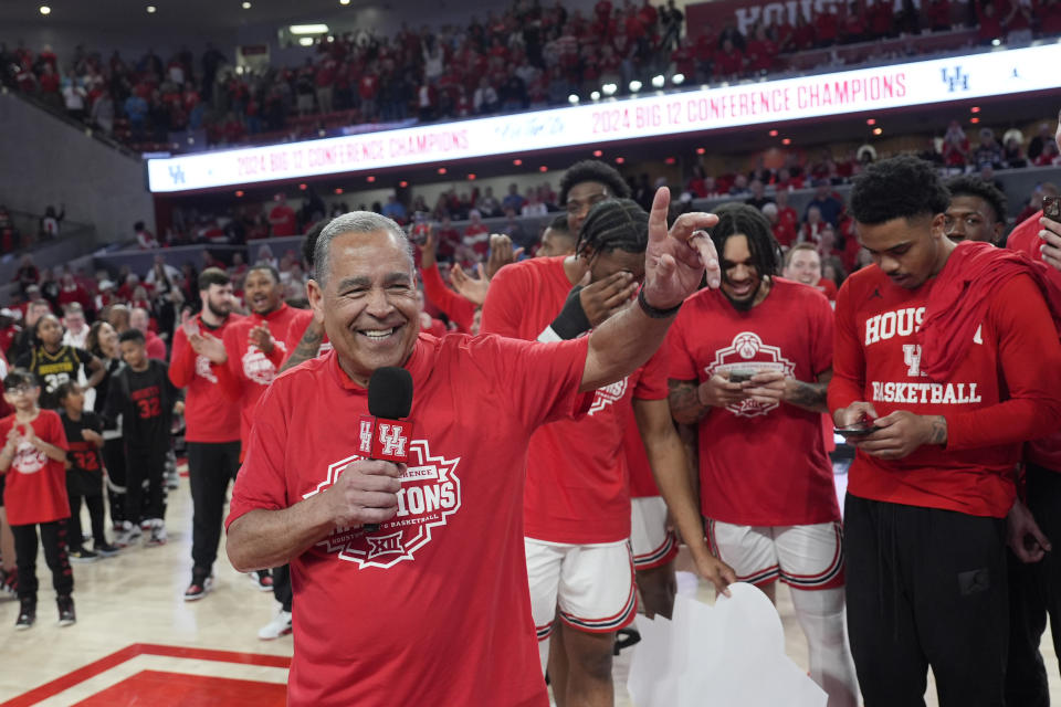 Houston coach Kelvin Sampton celebrates as he speaks to the crowd after an NCAA college basketball game against Kansas Saturday, March 9, 2024, in Houston. Houston won 76-46 and finished the regular season as the Big 12 Conference Champions. (AP Photo/David J. Phillip)