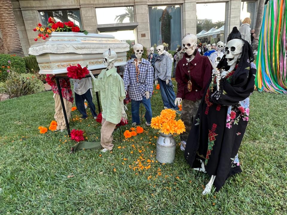 A funeral procession of skeletons is displayed at the Día de Los Muertos celebration at the Hollywood Forever Cemetery in Los Angeles on Saturday, Oct. 28, 2023.