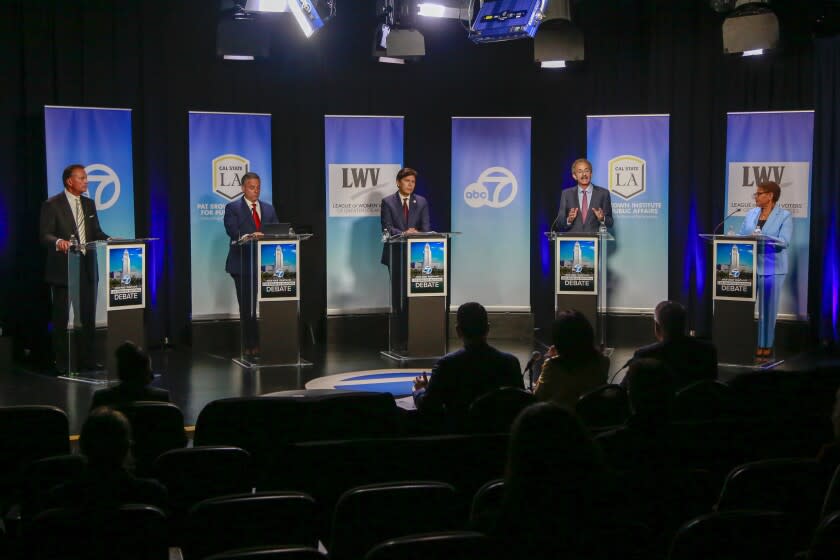 (From L to R) Businessman Rick Caruso , Los Angeles City Councilman Joe Buscaino, Los Angeles City Councilman Kevin de Leon, Los Angeles City Attorney Mike Feuer and U.S. Rep. Karen Bass, attend a mayoral debate at Student Union Theater on the Cal State LA campus on May 1, 2022. (Photo by Ringo Chiu / For The Times)