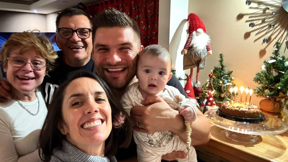 Janette Manrara and Aljaz Skorjanec family photo with baby Lyra and grandparents 