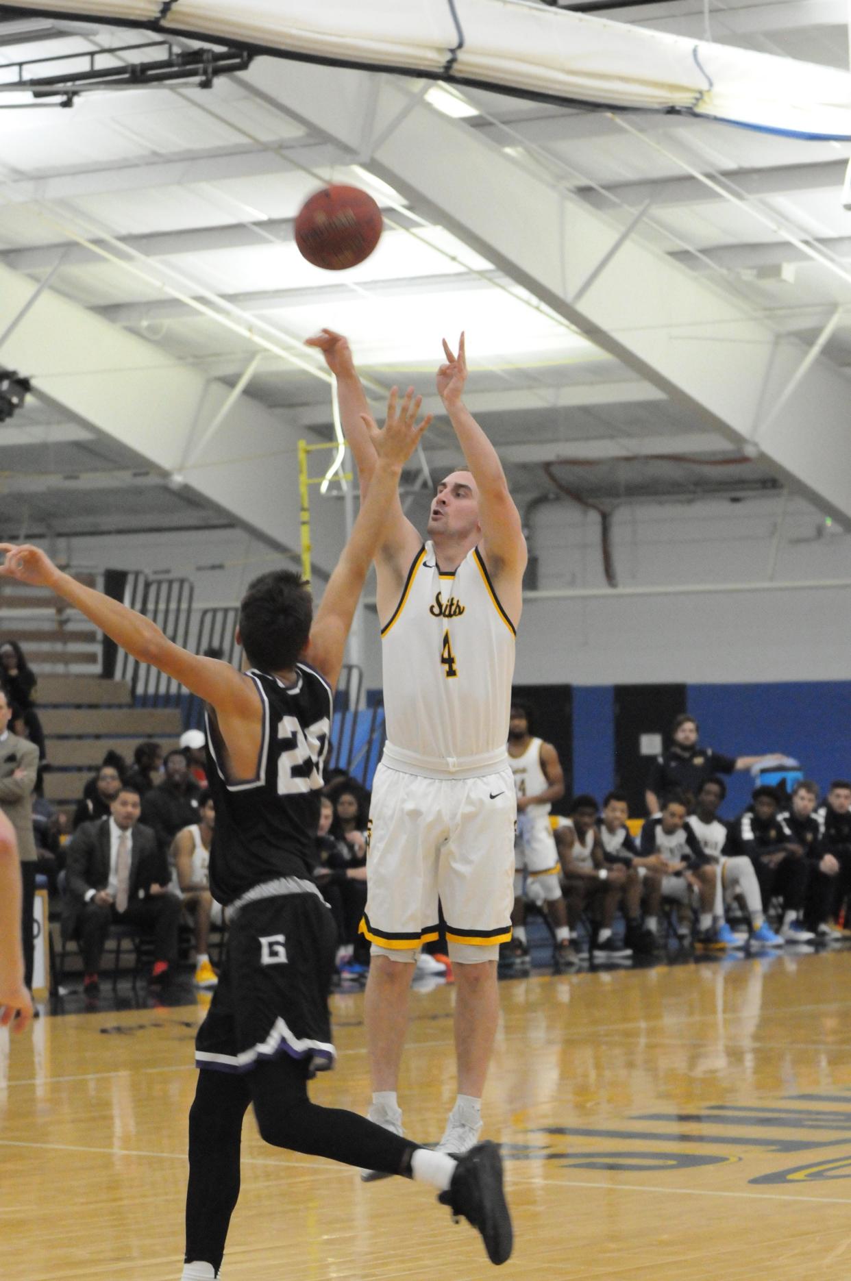 Jon Hovermale shoots a 3-pointer during a game in the 2018-19 season.