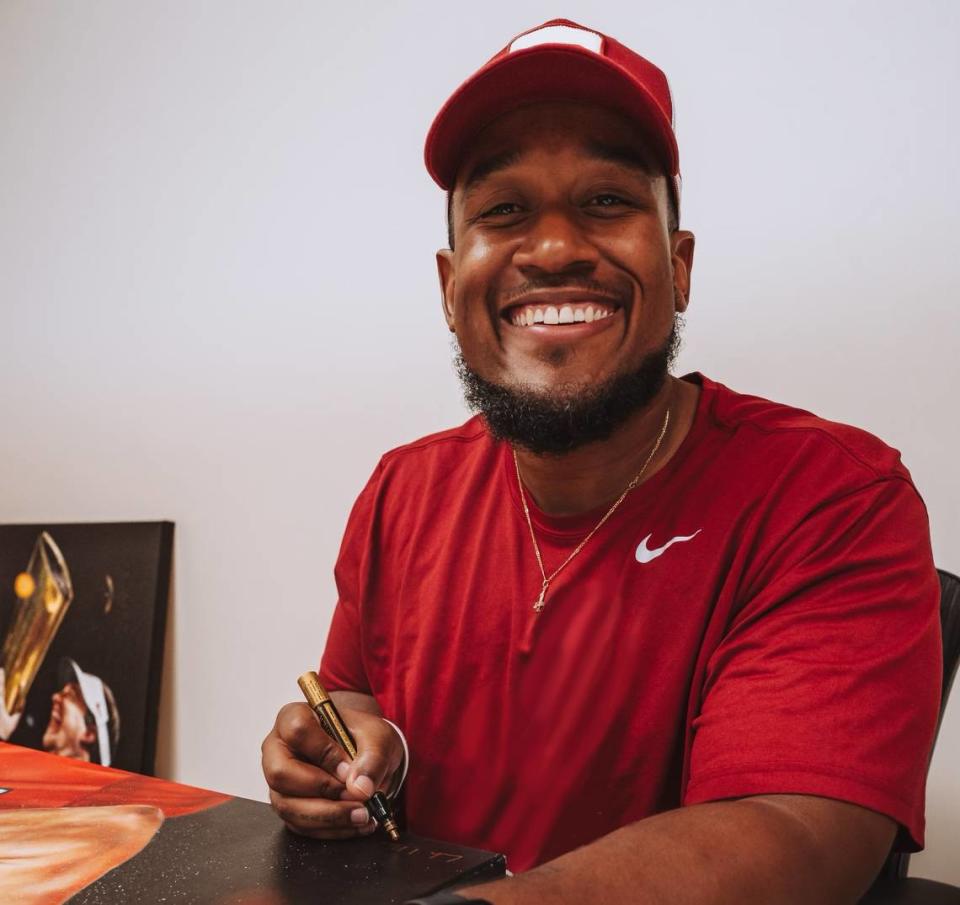 Artist Caleb Brown says his love of college football inspired him to create the Georgia Bulldogs’ championship paintings. //Courtesy of Caleb Brown