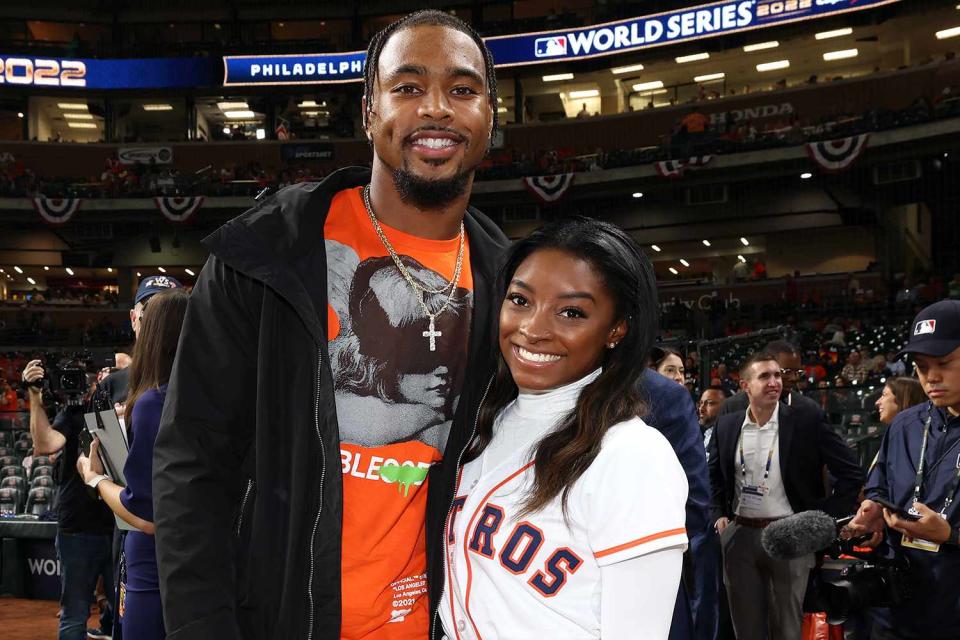 Mary DeCicco/MLB Photos via Getty Images Olympic gold medalist Simone Biles and Green Bay Packers safety Jonathan Owens