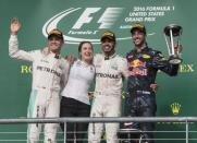 Oct 23, 2016; Austin, TX, USA; Mercedes driver Nico Rosberg (6) of Germany and Victoria Vowles of Mercedes and Mercedes driver Lewis Hamilton (44) of Great Britain and Red Bull Racing driver Daniel Ricciardo (3) of Australia wave to the crowd after the United States Grand Prix at the Circuit of the Americas. Mandatory Credit: Jerome Miron-USA TODAY Sports