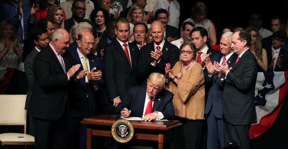 President Donald Trump with lawmakers