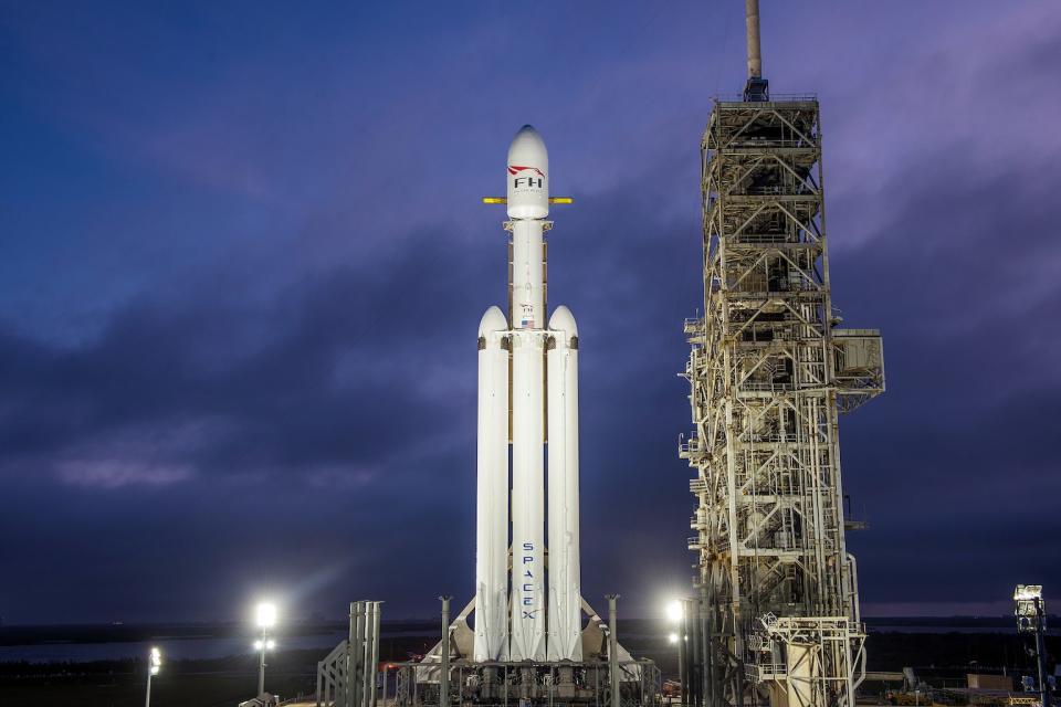 SpaceX's first Falcon Heavy rocket stands atop Launch Pad 39A at NASA's Kennedy Space Center in Cape Canaveral, Florida. The rocket's debut launch is scheduled for Feb. 6, 2018. <cite>SpaceX</cite>