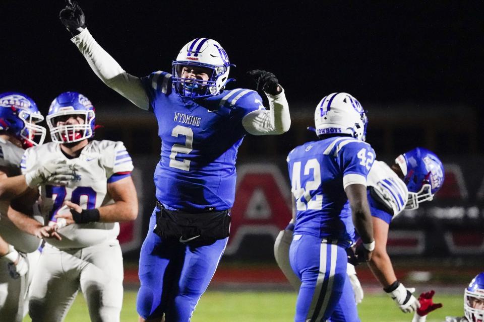 Wyoming linebacker Quaid Hauer (2) celebrates after a missed  Clinton-Massie field goal attempt during the first half of an OHSAA Division IV high school football regional semifinal at Lakota West High School, Saturday, Nov. 12, 2022.