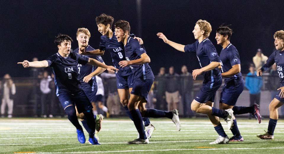 CBA celebrate their second goal of game. Christian Brothers Academy defeats Howell 2-1 in Shore Conference Tournament Final in Neptune NJ. October 22, 2022. 