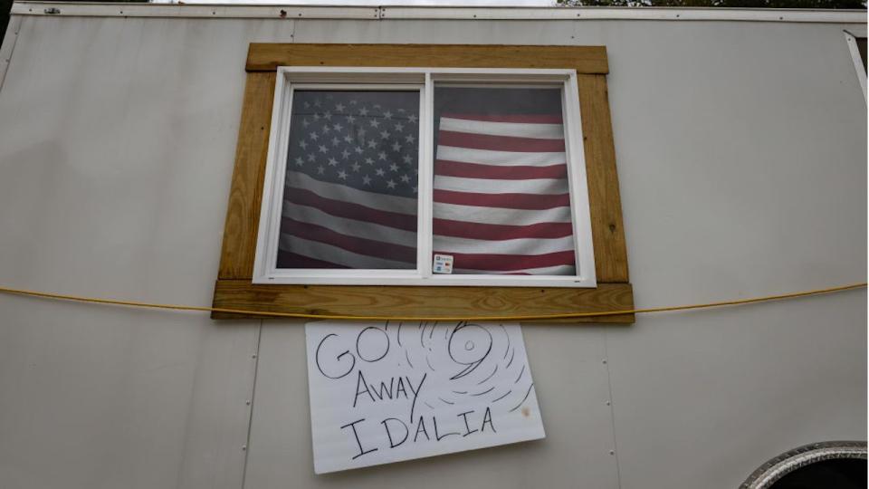 A resident posted a sign at a home in Cedar Key, Florida, as Hurricane Idalia threatened the area.