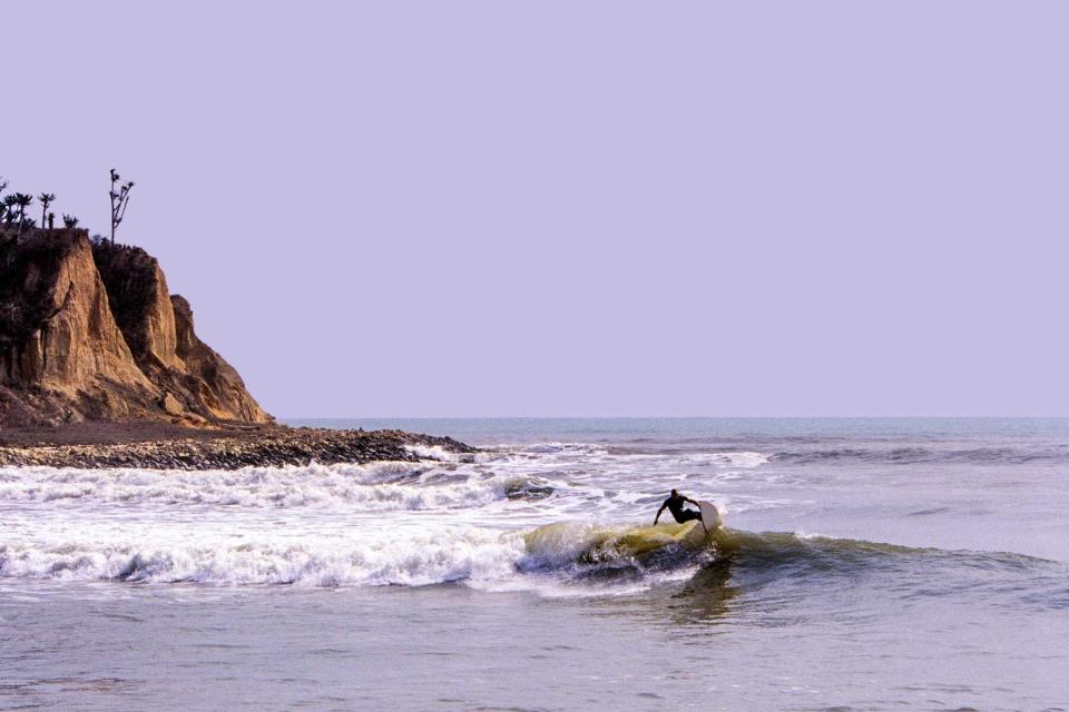 Angola, Bengo, surfing at Cabo Ledo on groundswells from the south Atlantic Ocean