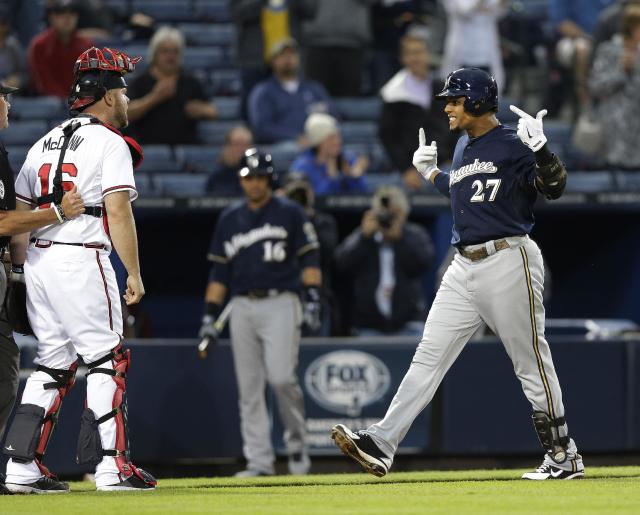 Carlos Gomez suspended and vindicated after tussle with Braves