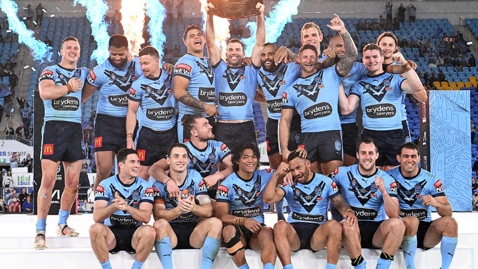 NSW players, pictured here celebrating with the State of Origin shield.