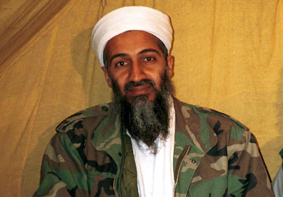 FILE - This undated file photo shows al Qaida leader Osama bin Laden in Afghanistan. At the center of a hotly disputed Senate torture report is America’s biggest counterterrorism success of all: the killing of Osama bin Laden. The still-classified, 6,200-page review concludes that waterboarding and other harsh interrogation methods provided no key evidence in the hunt for bin Laden, according to congressional aides and outside experts familiar with the investigation. The CIA still disputes that conclusion. (AP Photo, File)
