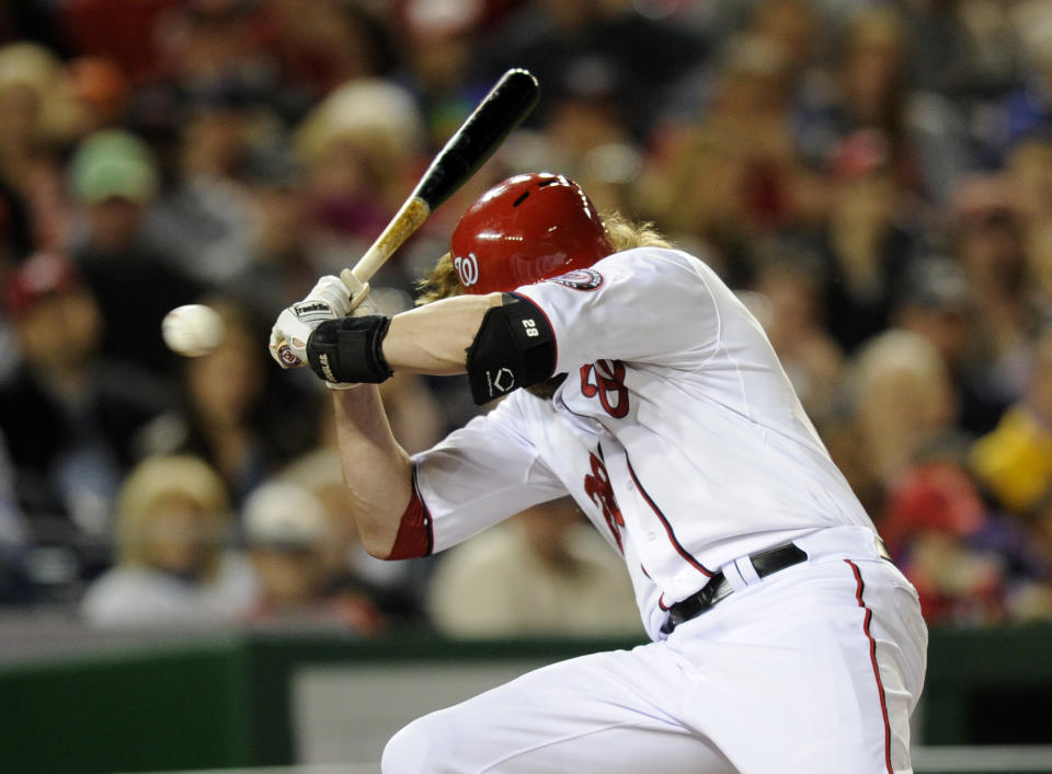 Washington Nationals' Jayson Werth reacts after he was hit by a pitch by Los Angeles Angels starting pitcher Garrett Richards, not seen, during the fourth inning of a baseball game, Monday, April 21, 2014, in Washington. (AP Photo/Nick Wass)